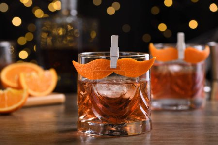 The Sharpie Mustache is a cocktail that's easy to make with equal parts rye whiskey, gin, sweet vermouth and a few drops of bitters, and garnished with a mustache-shaped orange zest