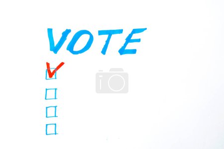 Foto de Voten palabra sobre un fondo blanco. Concepto de votación. - Imagen libre de derechos