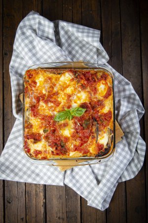 Photo for Eggplant parmesan oven baked with basil - Royalty Free Image