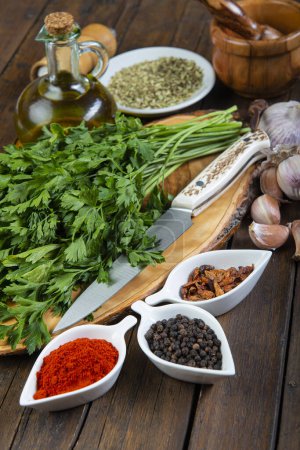 Photo for Chimichurri argentine sauce and ingredients  to prepare it - Royalty Free Image
