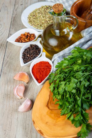 Photo for Chimichurri argentine sauce and ingredients  to prepare it - Royalty Free Image