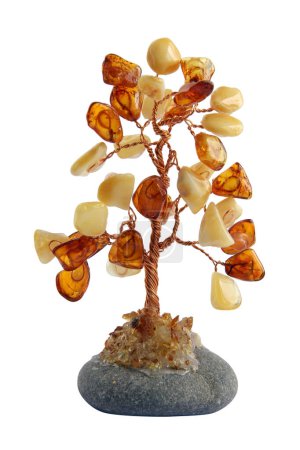 Homemade tree made from glue wire and amber . Isolated on white