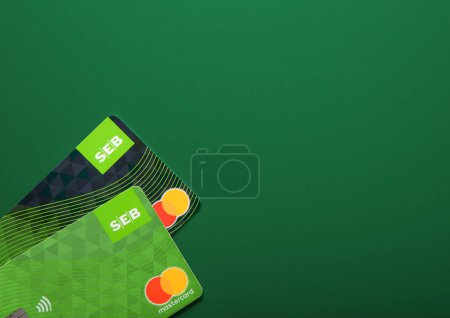 Photo for LONDON,UK - NOVEMBER 05, 2022: Seb bank credit and debit mastercard on green background.Space for text - Royalty Free Image
