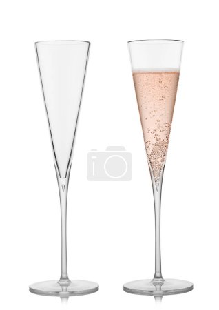 Photo for Elegant luxury glass with pink rose champagne with bubbles on white. Fine empty and full glass. - Royalty Free Image