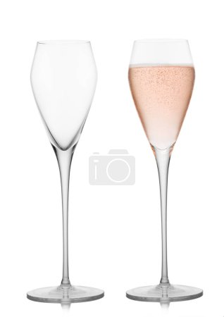 Photo for Prosecco wine and pink rose champagne empty and full glasses on white. - Royalty Free Image