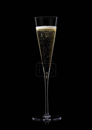 Photo for Yellow golden champagne fine crystal elegant glass on black. - Royalty Free Image