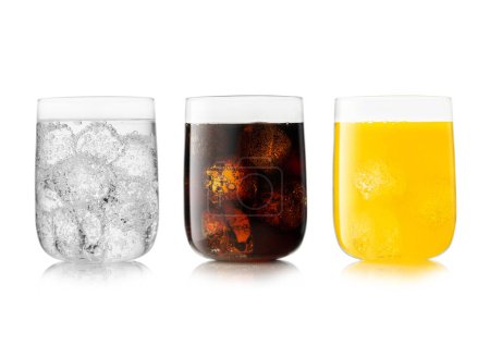 Téléchargez les photos : Three large glasses with cola soft drink with orange soda and lemonade. - en image libre de droit