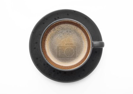 Téléchargez les photos : Large black coffee in porcelain cup with saucer on white. Top view. - en image libre de droit