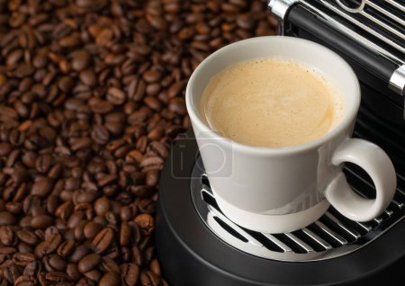 Photo for Coffee cup with espresso machine and raw aroma beans.Macro - Royalty Free Image