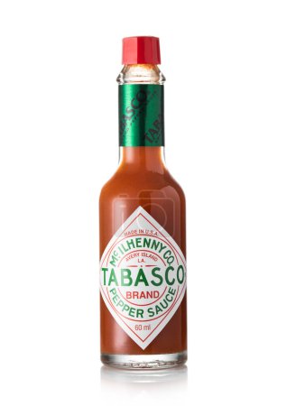 Photo for LONDON, UK - MARCH 12, 2023: Tabasco red hot pepper sauce bottle on white. - Royalty Free Image