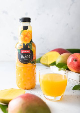 Photo for LONDON,UK - MAY 01, 2023: Bottle of Granini selection fresh mango juice and glass. Most popular juice band. - Royalty Free Image