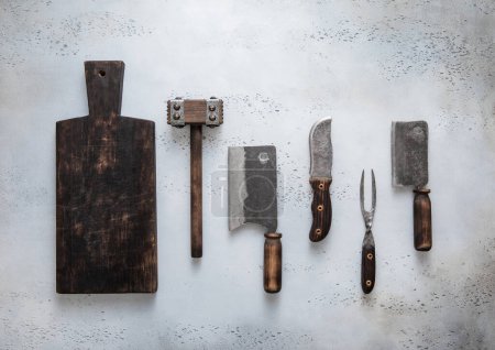 Photo for Kitchen meat utensils with wooden chopping board on light background. - Royalty Free Image