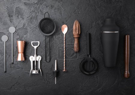 Photo for Strainer,shaker,jigger,straw,manual juicer,wooden muddler,wine opener on black stone background with copper bar spoon. - Royalty Free Image