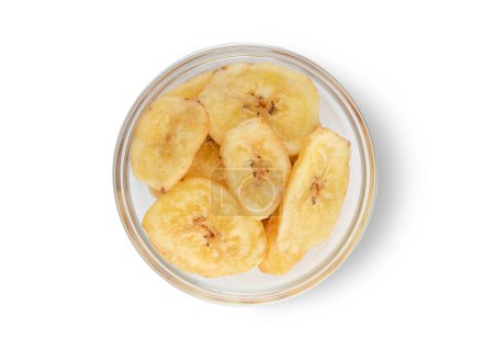 Foto de Sano orgánico secado chips de plátano dulce sobre fondo blanco. vista superior. - Imagen libre de derechos