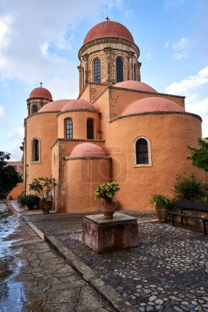 domes of a historic Orthodox church in the historic monastery of Agia Triada on the island of Crete, Greece