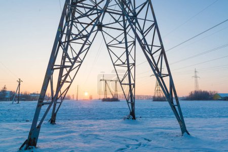 Power line grid in the cold winter morning in Ukraine. Blackout and lack of electricity illustration 