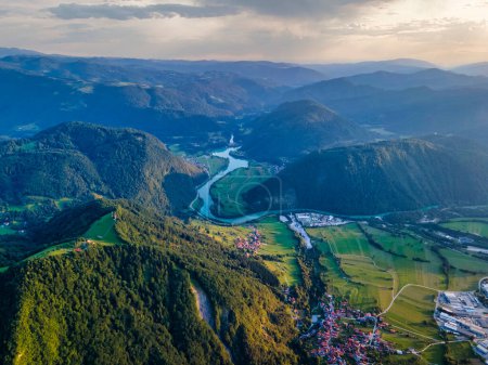 Aerial view of Soca valley, Slovenia. Winding emerald river in sthe mountain valley. Europe popular summer tourist destination. 