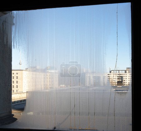 Condensation on the windows in the Martin Gropius Bau, view of Wilhelmstrasse and Berlin-Kreuzberg, Berlin, Germany