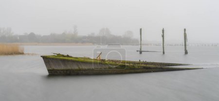 Photo for Long exposure, ship's bow in the Bodden, Dranske, Rgen, Mecklenburg-Western Pomerania, Germany - Royalty Free Image