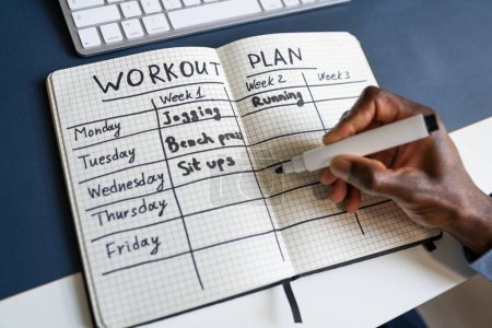 Photo for Workout Training Exercise Plan And Daily Schedule - Royalty Free Image