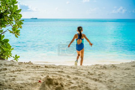 Photo for Fun Beach Travel Vacation. Kid Running In Summer - Royalty Free Image