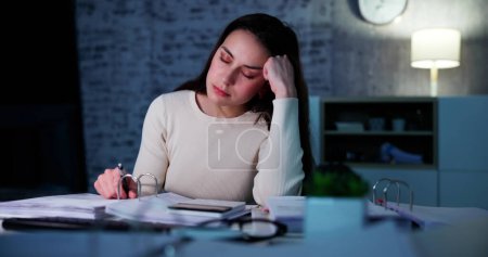 Photo for Stressed Tax Advisor With Headache. Sad Accountant - Royalty Free Image