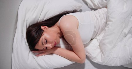Photo for Women Sleeping On Pillow In Bed. Face Beauty - Royalty Free Image