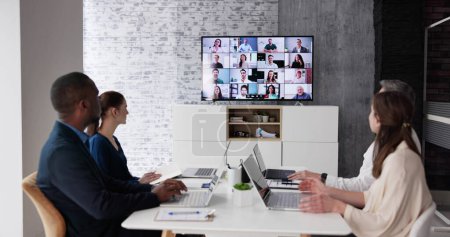 Photo for Business Video Conference Call In Meeting Room - Royalty Free Image