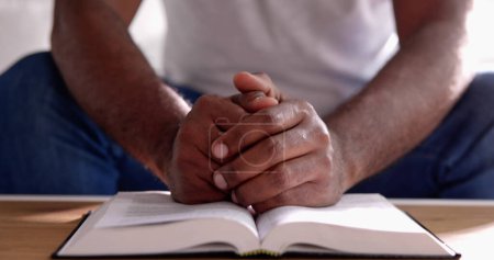 Photo for African American Black Christian. Bible In Prayer Hands - Royalty Free Image