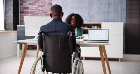 Photo for Employee Disability After Injury. Man In Wheel Chair - Royalty Free Image