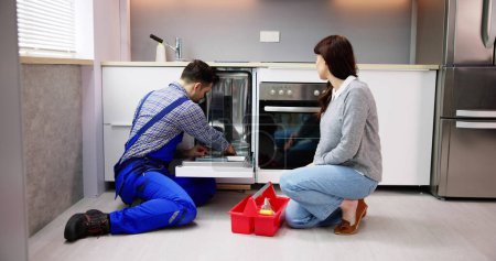 Photo for Dishwasher Machine Appliance Repair. Household Handyman Service - Royalty Free Image
