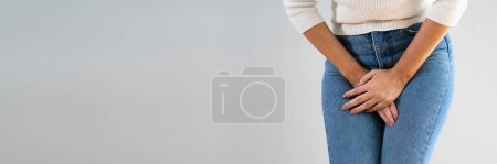 Photo for Bowel Incontinence Pain. Woman Hand Holding Crotch - Royalty Free Image