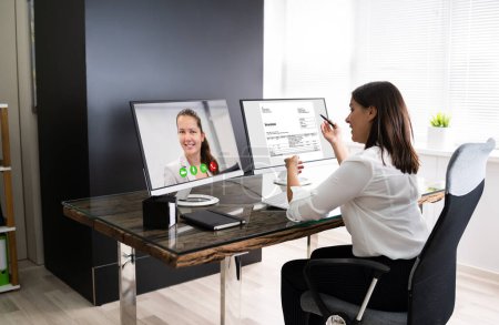 Photo for Video Conferencing Webinar Meeting. Watching Online On Multiple Screens - Royalty Free Image