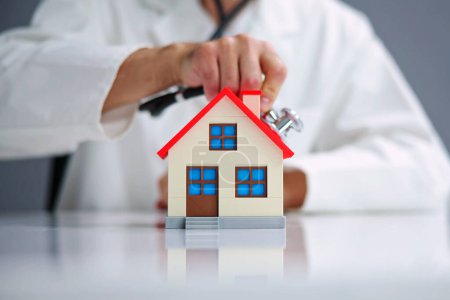 Photo for Doctor Doing Homecare Inspection. House Property Check - Royalty Free Image