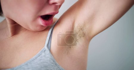 Photo for Young Woman With Hairy Armpit. Hair Removal And Shaving - Royalty Free Image
