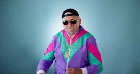 Photo for Fat Old Grandpa Man With Gold Chain Dancing - Royalty Free Image