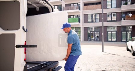 Photo for Mattress Delivery Truck. Movers Transporting And Shipping - Royalty Free Image