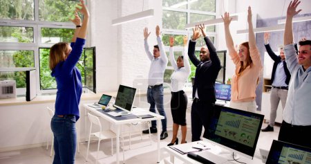 Photo for Stretch Exercise In Office For Business Worker Team - Royalty Free Image