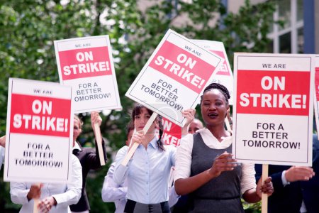 Photo for Workers Strike Demonstration In City. Labor Union March. Protest Rally - Royalty Free Image