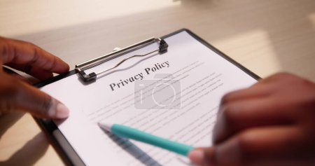 Photo for Privacy Policy Notice And Legal Agreement. Woman Reading Contract - Royalty Free Image