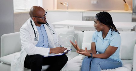 Photo for African Medical Doctor Talking To Patient. Health Service - Royalty Free Image