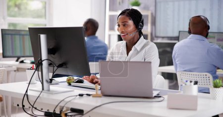 Photo for Portrait Of A Smiling African Female Customer Service Executive - Royalty Free Image