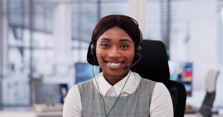 Photo for Professional Woman Providing Exemplary Customer Service with Headset - Royalty Free Image