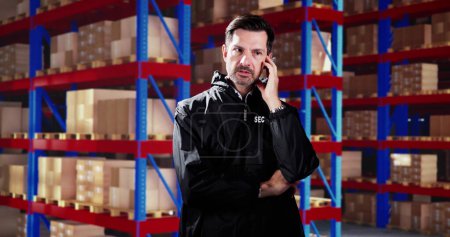 Photo for Security Guard Officer In Logistic Business Distribution Warehouse - Royalty Free Image