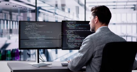 Web Developer Coding On Computer To Develop Code