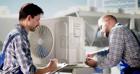 Photo for Air Conditioner Install. Commercial HVAC Maintenance Service - Royalty Free Image