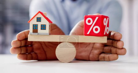 Photo for House Interest Rates Balance And Loan Percentage Concept - Royalty Free Image