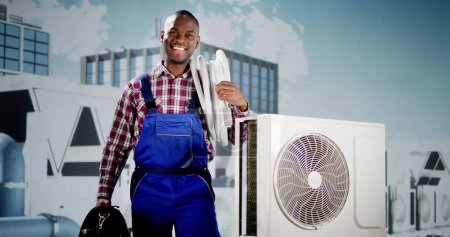 Photo for Technician Cleaning And Repairing Air Condition Appliance. Ac Unit Maintenance - Royalty Free Image