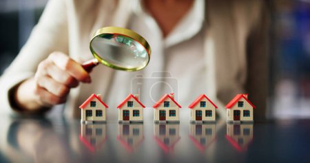 Real Estate House Inspection Before Purchase. Inspector Using Magnifier Glass
