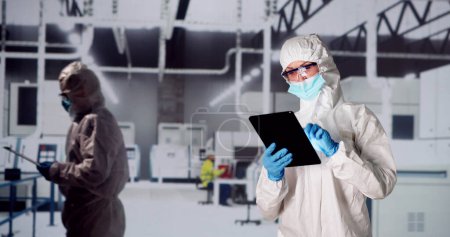 Factory Clean Room Laboratory. Industrial Engineer Using Technology